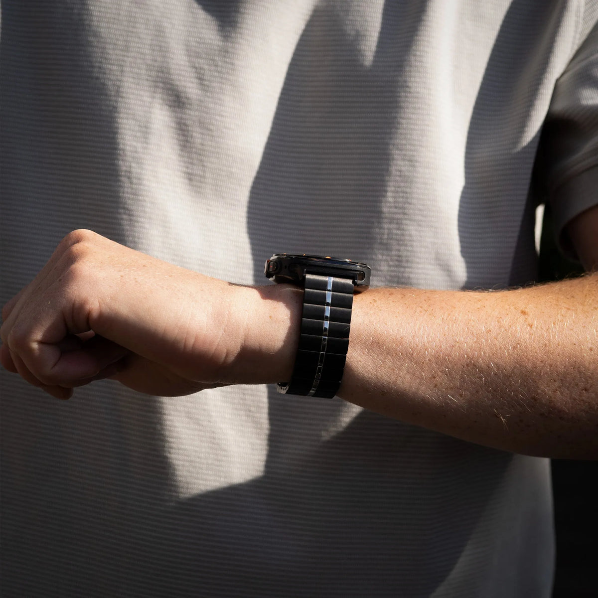 Premium Metal Strap, black/silver, lifestyle photo
