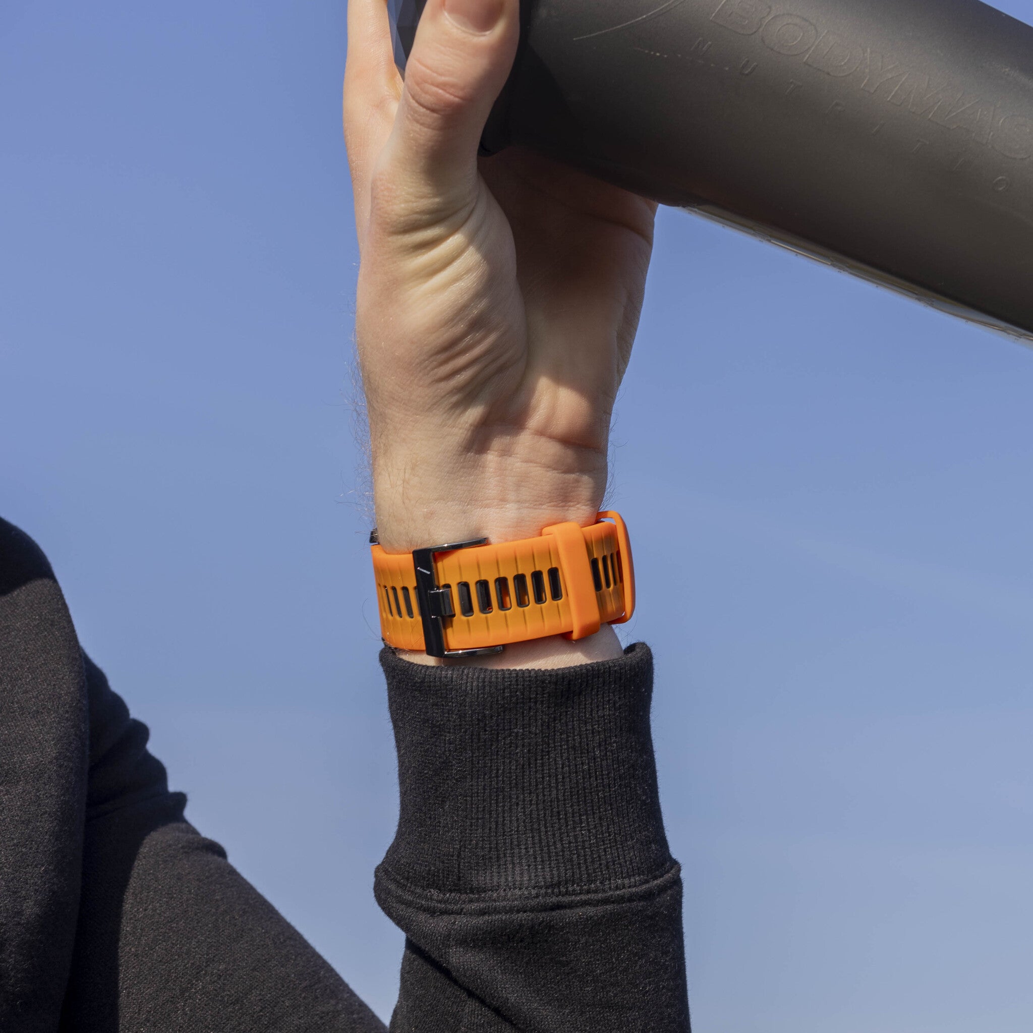 Garmin Fenix 8 Pro - 51mm Sport Armband mit Schnalle (Orange/Schwarz)