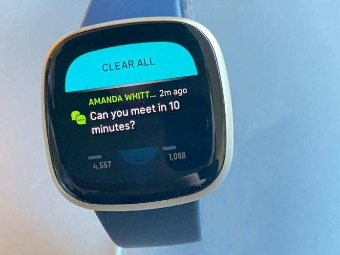How does WhatsApp work on Fitbit?