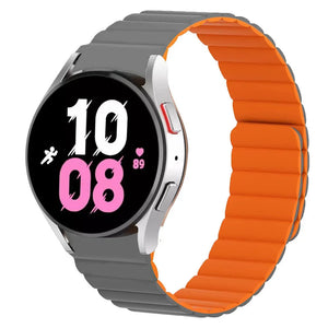 Magnetic Silicone Strap, grey/orange, on a watch, 3/4 front view