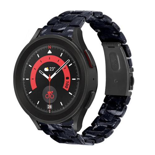 Metal Resin Strap, black/white, on a watch, 3/4 front view