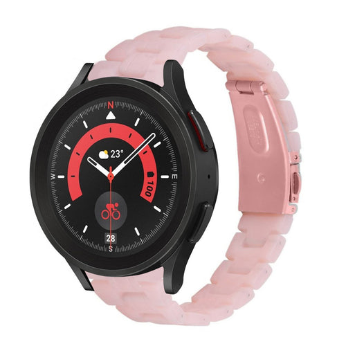 Metal Resin Strap, pink, on a watch, 3/4 front view