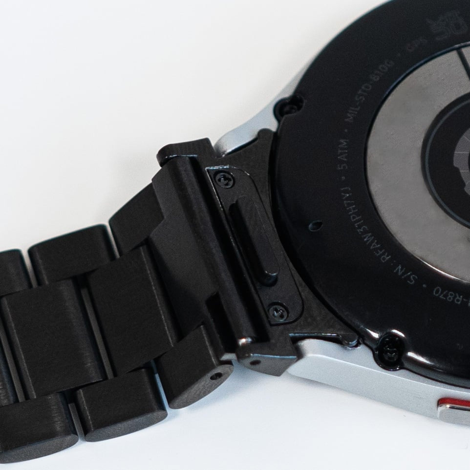 Steel Strap 'One Push', black, on a watch, 3/4 rear view