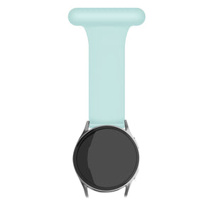 Silicone Nurse Fob, light green, on a watch, direct front view