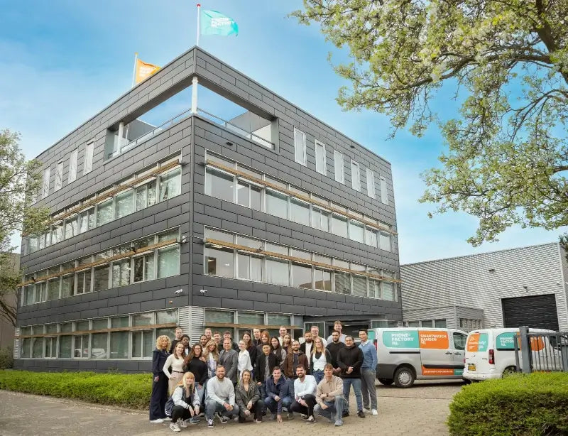 Our team in front of our office